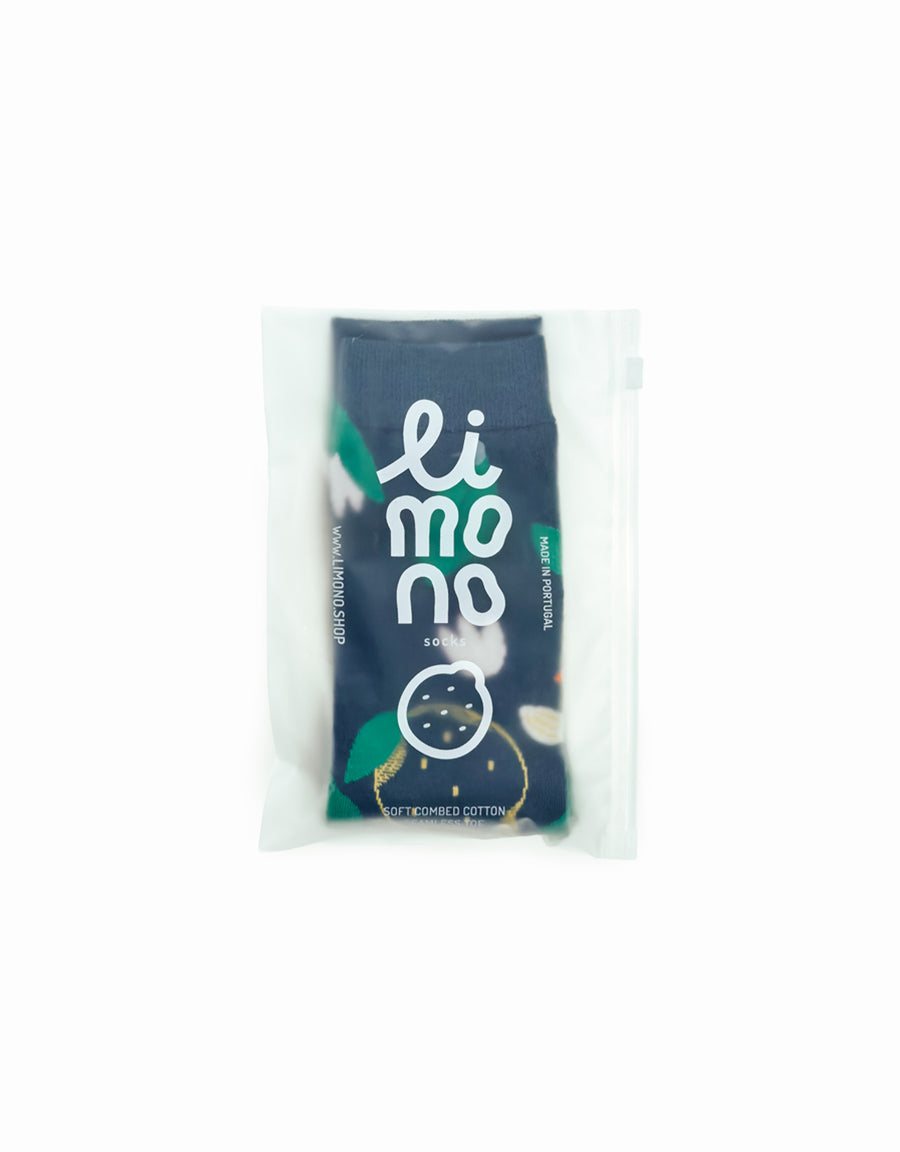 Limono Lemonheads Black sock packaged in a clear poly bag with limono branding