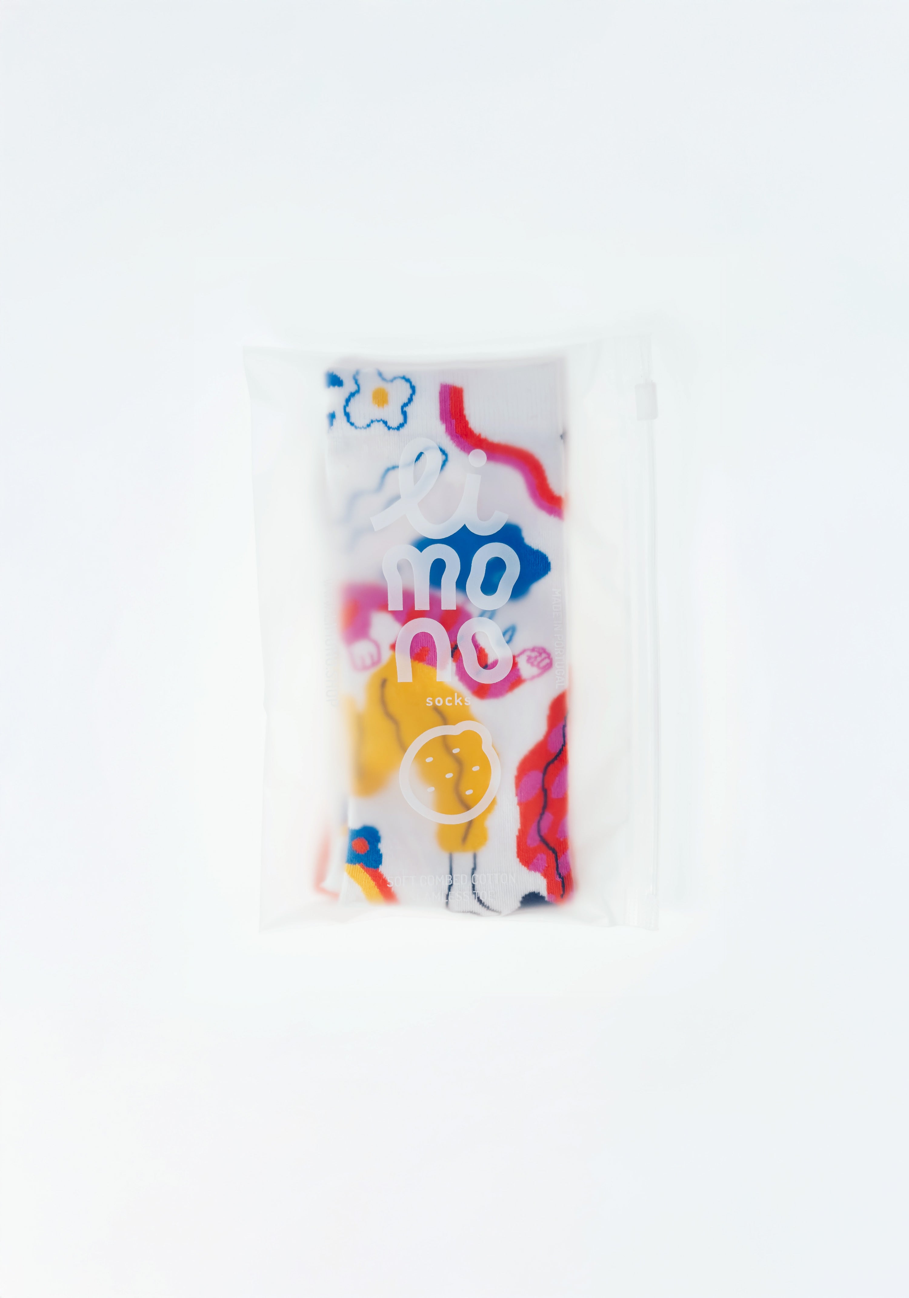 Limono Socks Rain Clouds collection. Illustrated socks on trend made in Portugal. Organic combed cotton. Colorful children's juice box with cartoon characters on a white background