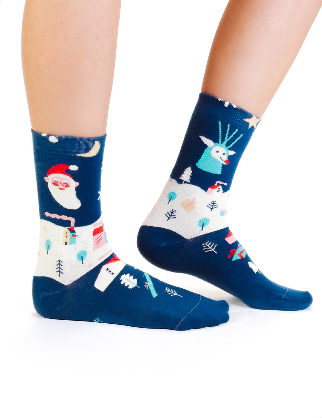 Limono Christmas Navy socks with Santa, deer and moon motifs worn on legs