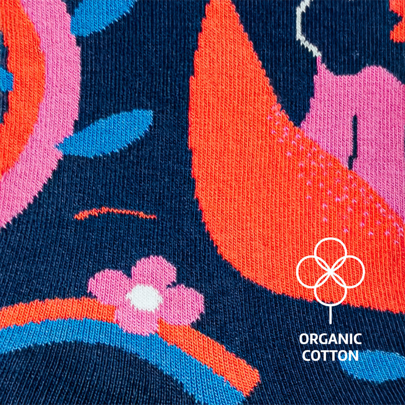 Limono Socks Rain Clouds collection. Illustrated socks on trend made in Portugal. Organic combed cotton. Close-up of colorful fabric with floral pattern and organic cotton logo