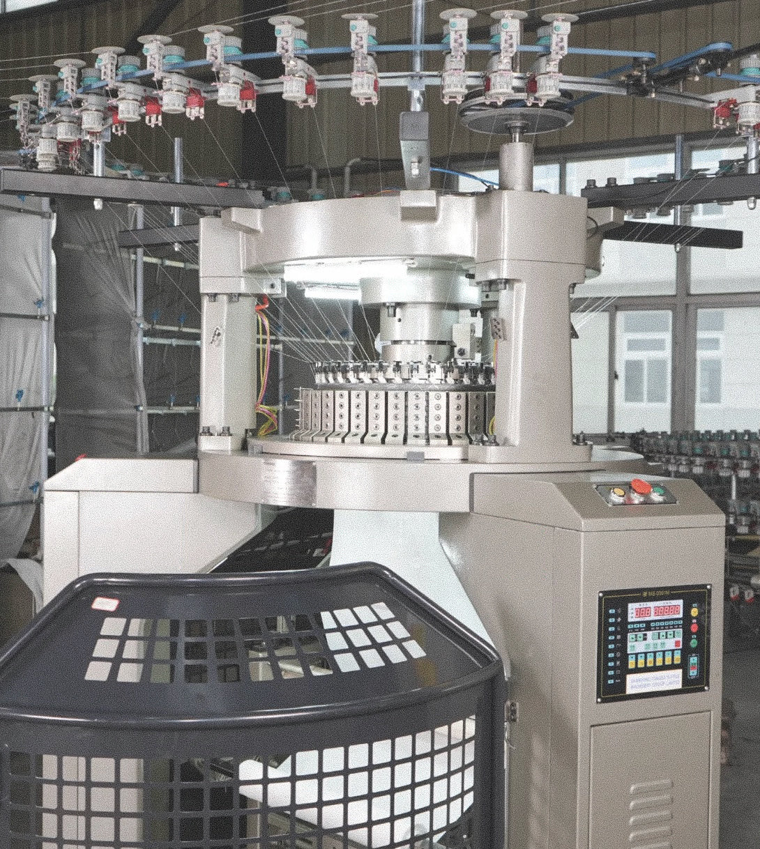 Limono studio industrial circular knitting machine, sock production with overhead yarn feeders