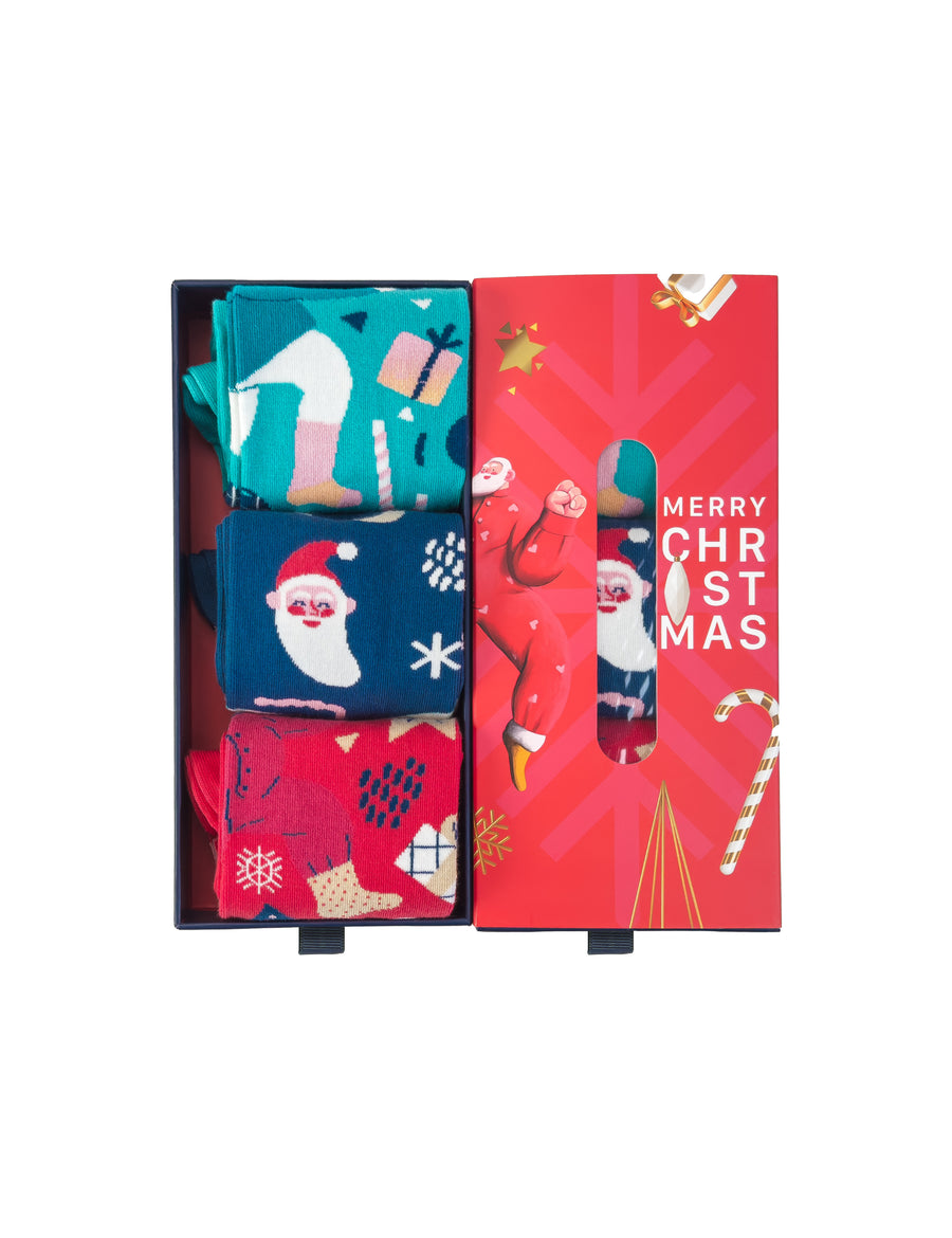 Limono Christmas Box of 3 flat lay with Turquoise, Navy, Red socks and Merry Christmas gift box