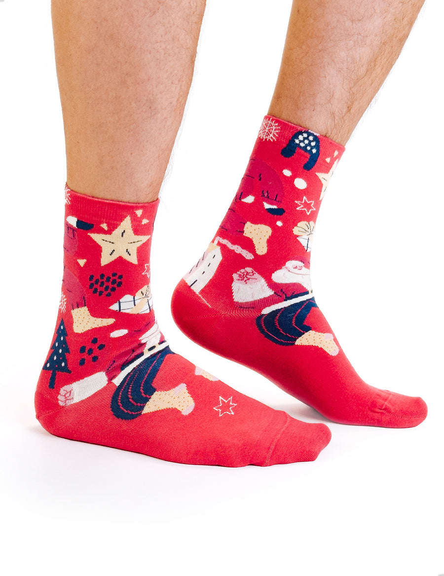 Limono Christmas Red socks with Santa, star and tree motifs worn on legs