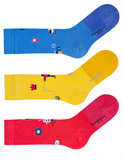 Limono Socks Robots Day collection. Illustrated socks on trend made in Portugal. Organic combed cotton. Three colorful socks in blue, yellow, and red with cartoon designs on a white background.