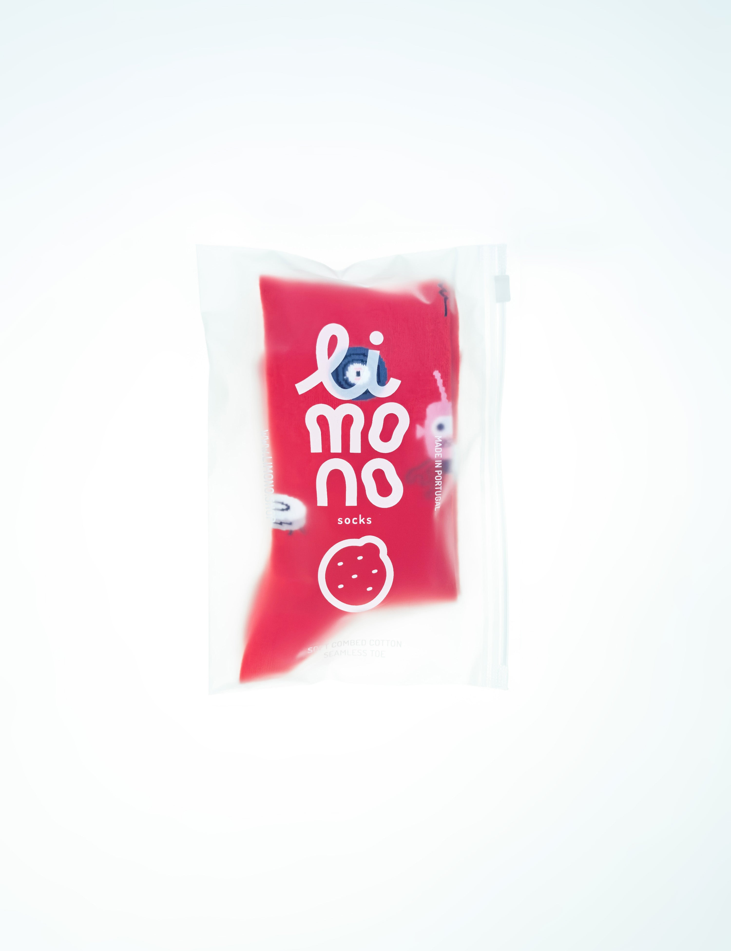 Limono Socks Robots Day collection. Illustrated socks on trend made in Portugal. Organic combed cotton. Red package with 'limono' branding on a white background