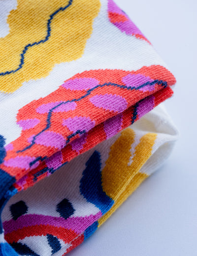 Limono Rain Clouds White socks jacquard knit macro with cloud-head character and rainbow detail