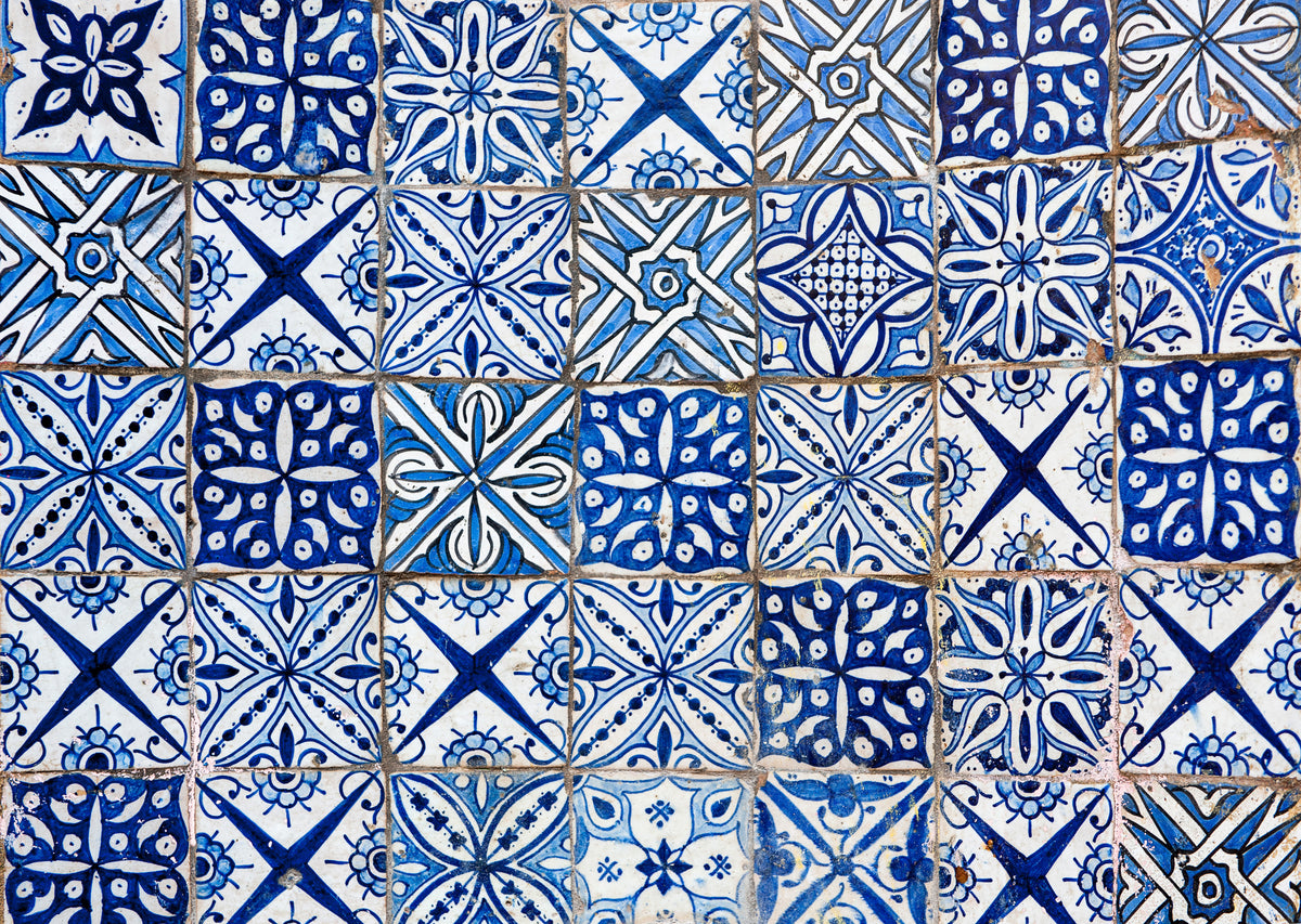 Blue and white Portuguese azulejos tiles with mixed geometric and floral patterns, Portugal