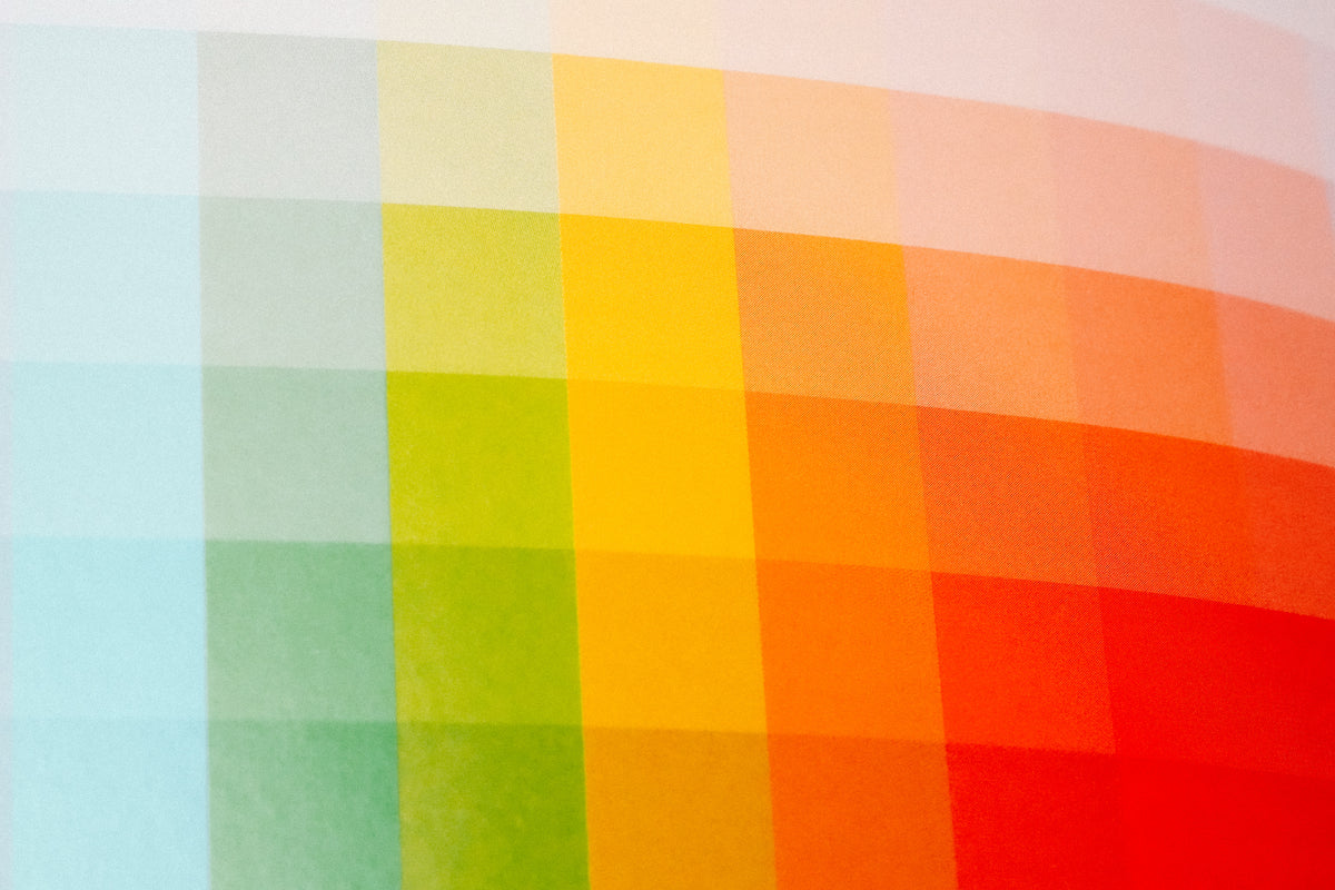 Translucent color spectrum print in blue, green, yellow, orange and red overlapping squares