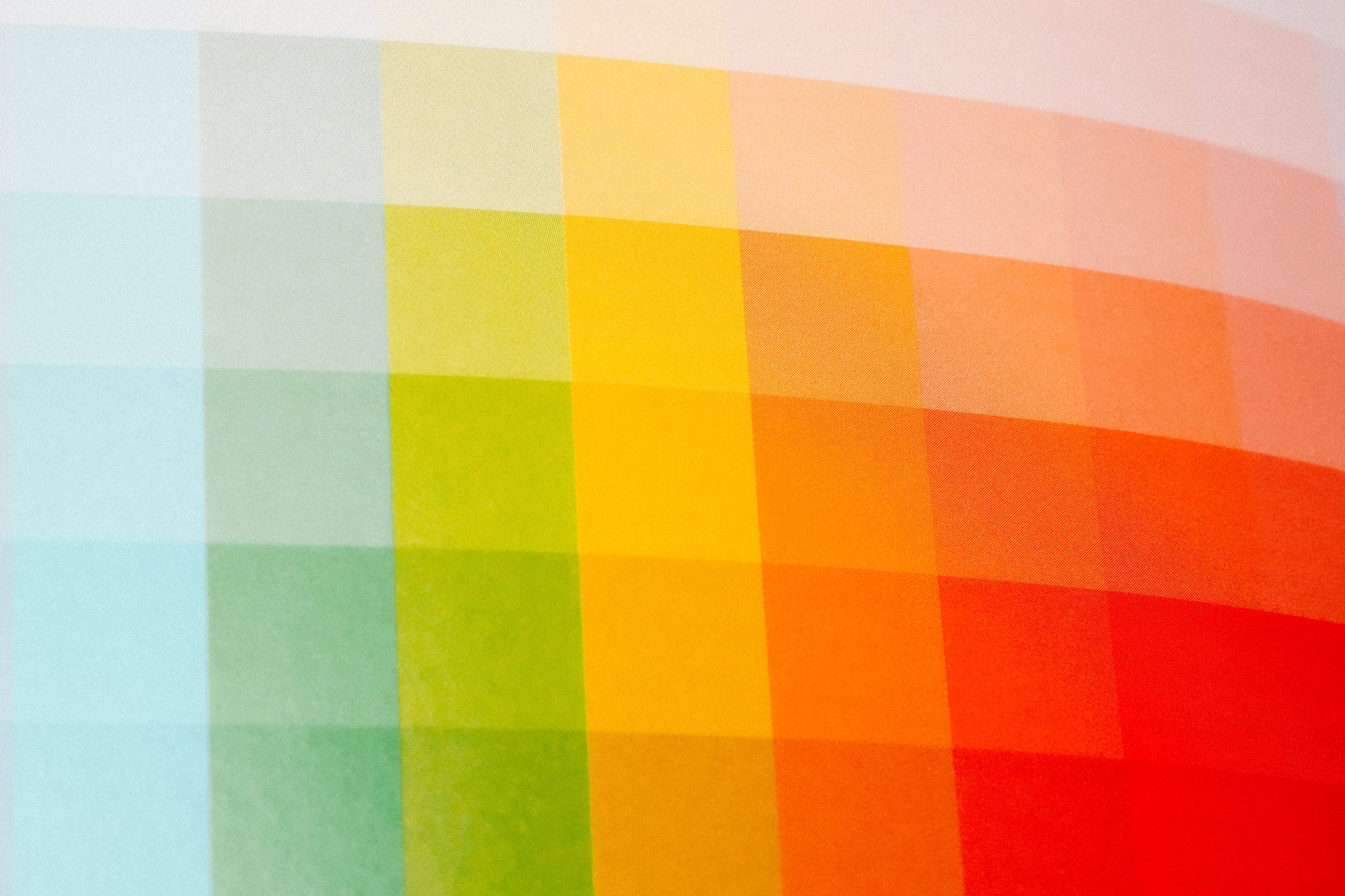 Translucent color spectrum print in blue, green, yellow, orange and red overlapping squares